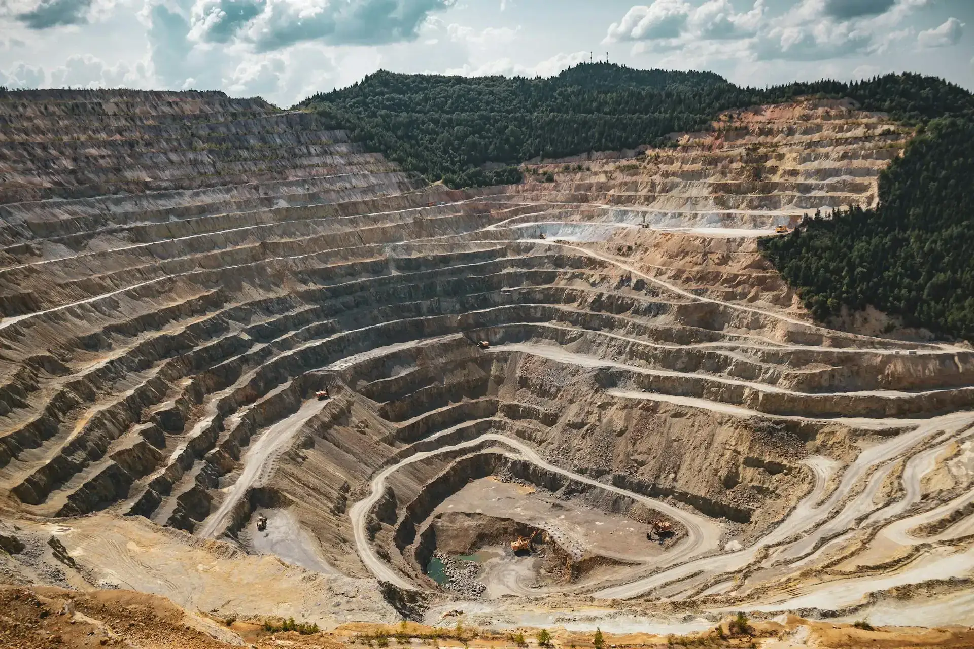 Open pit mine at sunset
